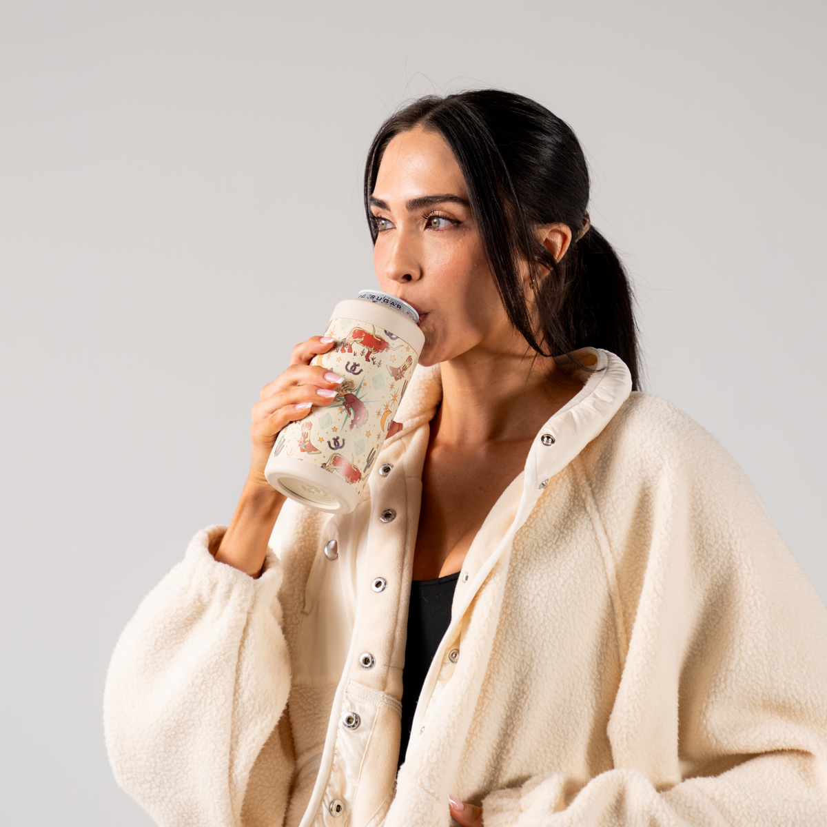 Woman Drinking from Rodeo Can Cooler 16oz
