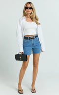 Jacqui Shorts - Mid Rise Frayed Hem Denim Shorts in Light Mid Blue