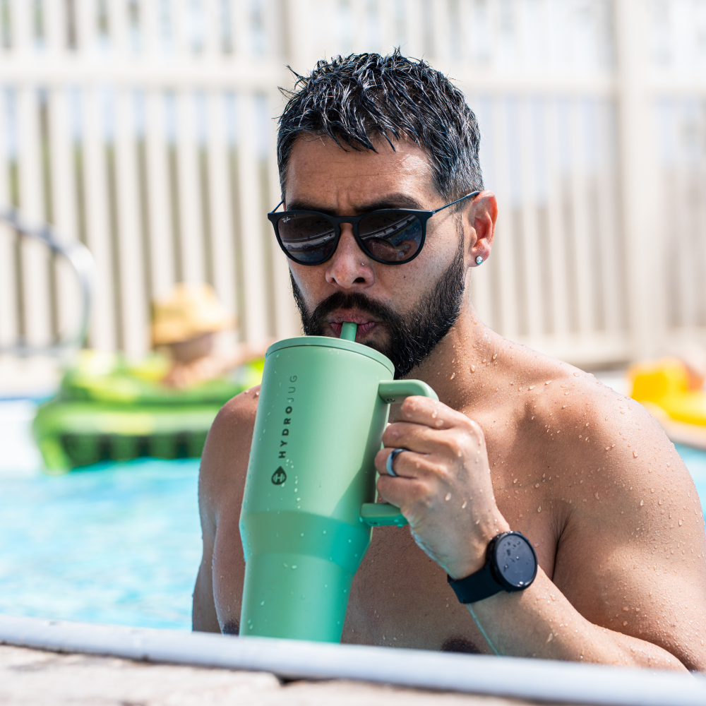 Man Drinking from HydroJug Sage Traveler 40oz