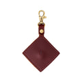 Cognac | Diamond shaped leather AirTag holder on a lobster clasp keychain